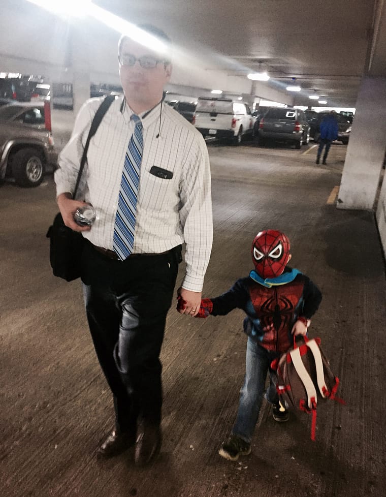 Calmly, the super hero makes his way through the metropolis...